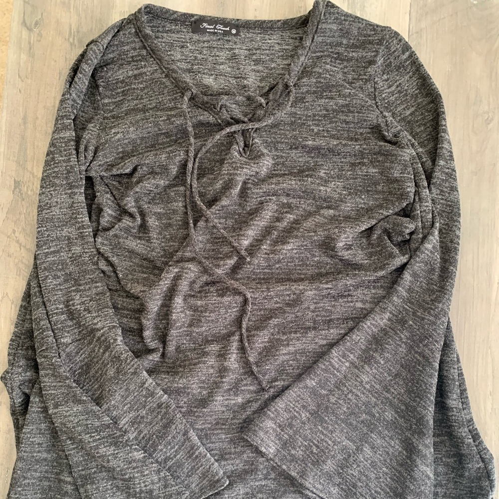Tunic style lace up front. Size medium. Bell sleeve.